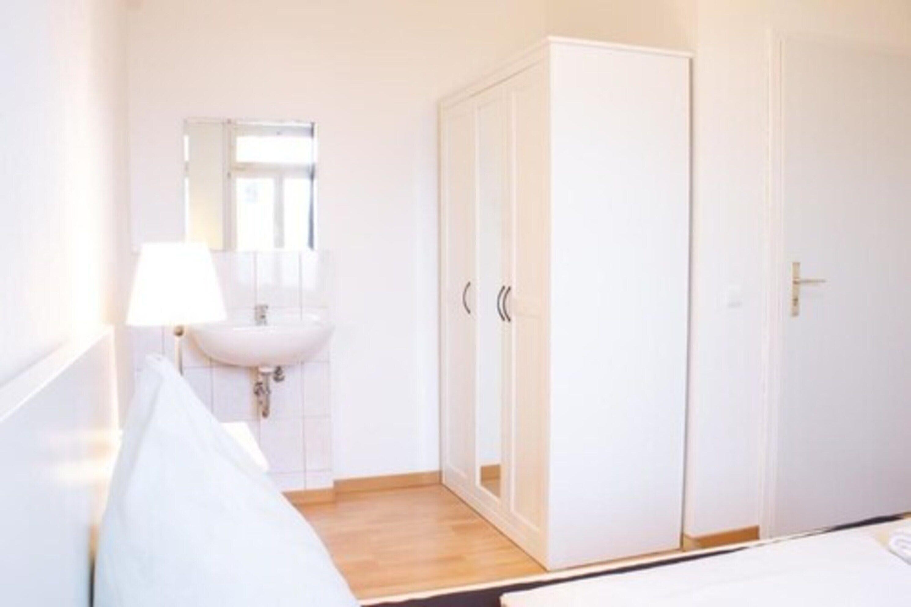 Vierbettzimmer mit Gemeinschaftsbad