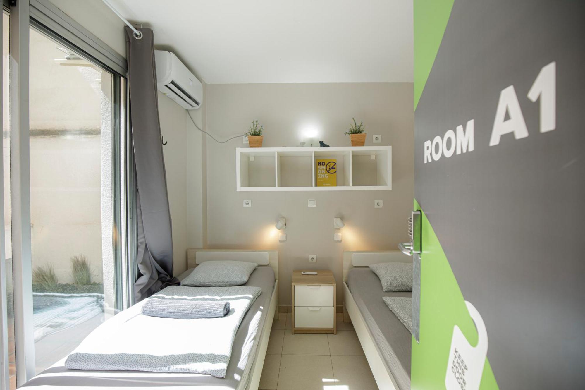 Zweibettzimmer mit Gemeinschaftsbad